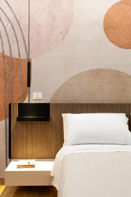 Letto o letti in una camera di Naos 71- Appartamento con balcone vicino Ortigia