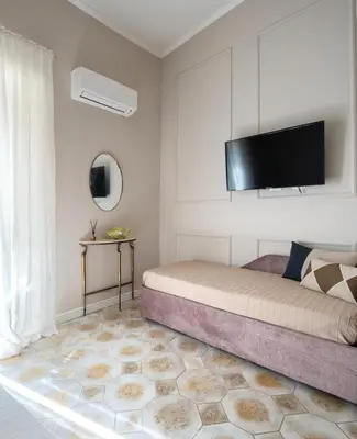 TV o dispositivi per l'intrattenimento presso Ziolì Apartment