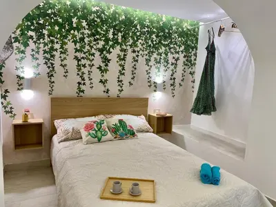Letto o letti in una camera di Suite with bathroom and private terrace