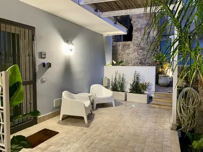 Area soggiorno di Suite with bathroom and private terrace