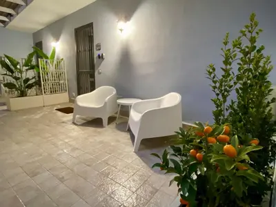 Area soggiorno di Suite with bathroom and private terrace