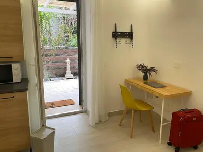 Cucina o angolo cottura di Suite with bathroom and private terrace