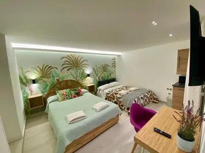 Letto o letti in una camera di Suite with bathroom and private terrace in the center