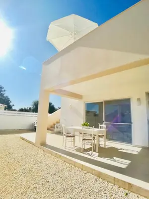 Balcone o terrazza di DolceVitaSuites - Modern 3BR Beach Villa in San Lorenzo with Sea View