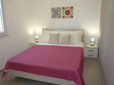Letto o letti in una camera di Villa Siciliu