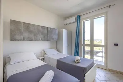 Letto o letti in una camera di Villa Mare Sud by Villa Plus