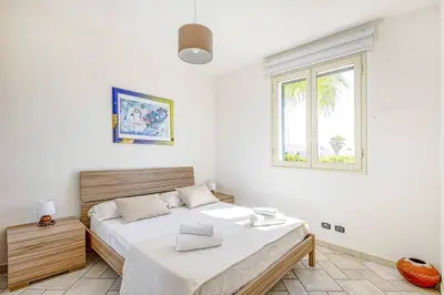 Letto o letti in una camera di Villa Mare Sud by Villa Plus