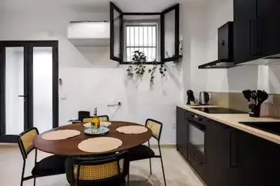 Cucina o angolo cottura di Ortigia - Domus Olea New Apartment near the Beach
