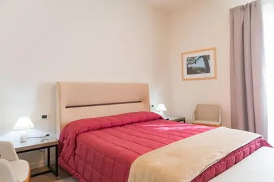 Letto o letti in una camera di Modica Suite