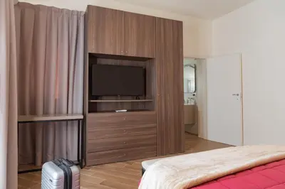 Letto o letti in una camera di Modica Suite