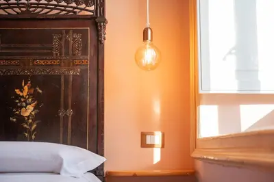 Letto o letti in una camera di Residenza Mistral Ortigia a 2 passi dal mare