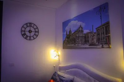 Letto o letti in una camera di Suite Garibaldi urban stay