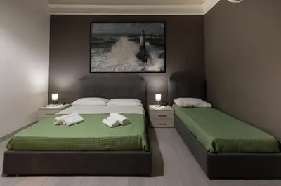 Letto o letti in una camera di Cinere Plebiscito