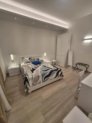 Letto o letti in una camera di E-Kosmos