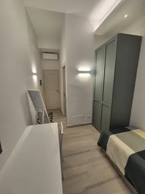 Letto o letti in una camera di E-Kosmos