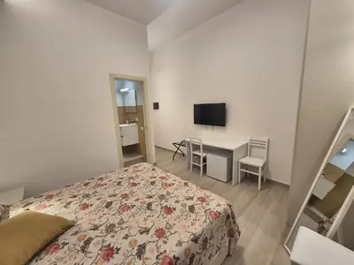 Letto o letti in una camera di E-Kosmos