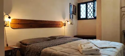 Letto o letti in una camera di Leontini Little House