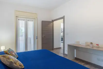 Letto o letti in una camera di villa con piscina vista mare