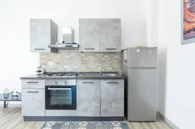 Cucina o angolo cottura di villa con piscina vista mare