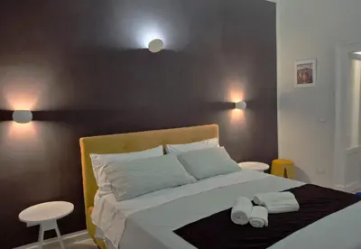 Letto o letti in una camera di NICETA House