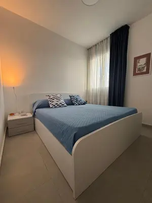 Letto o letti in una camera di HomeZap84