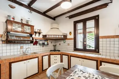 Cucina o angolo cottura di A Due passi dal Mare Villas