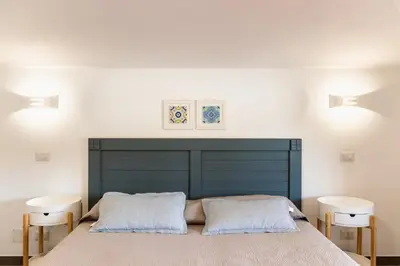 Letto o letti in una camera di A Due passi dal Mare Villas