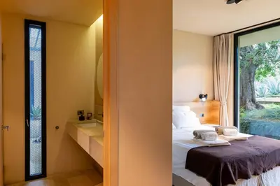 Letto o letti in una camera di Villa Adesso - IsulaTravel