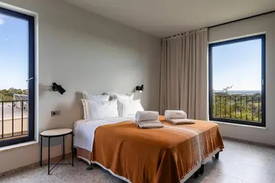 Letto o letti in una camera di IsulaTravel - Villa Amore