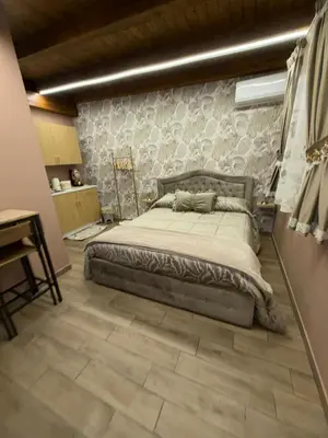 Letto o letti in una camera di Casa Vacanze Jennifer