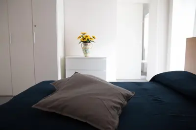 Letto o letti in una camera di Caleidoscopio Bianco