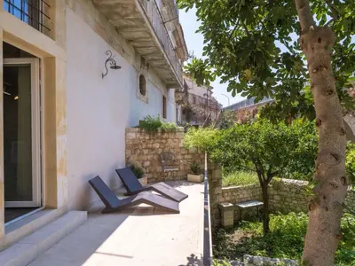 Giardino di Apartment Wohnung 'Casa del Pozzo' mit Terrasse by Interhome
