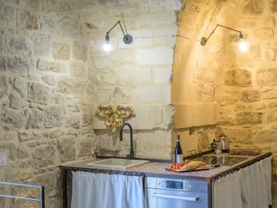 Cucina o angolo cottura di Apartment Wohnung 'Casa del Pozzo' mit Terrasse by Interhome