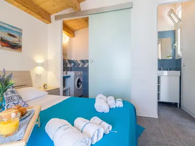 Cucina o angolo cottura di Apartment Oneiro- Unterkunft am Strand mit großer Terrasse by Interhome