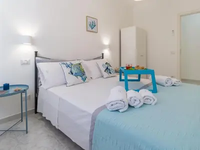 Letto o letti in una camera di Apartment Kairòs- Wohnung 10 m vom Sandstrand entfernt by Interhome
