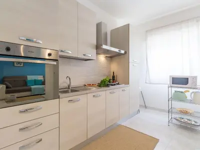 Cucina o angolo cottura di Apartment Kairòs- Wohnung 10 m vom Sandstrand entfernt by Interhome