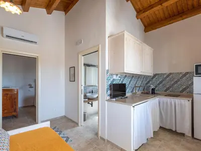 Cucina o angolo cottura di Apartment Il Gelso e l'Ulivo Wohnung mit Schwimmbad by Interhome