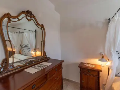 Letto o letti in una camera di Apartment Wohnung in Noto mit Terrasse- gemeinsamem Pool und Garten by Interhome