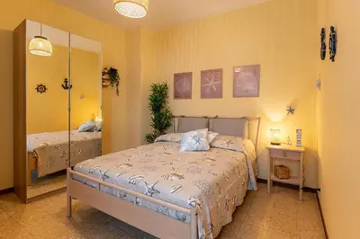 Letto o letti in una camera di Casa le Radici by Wonderful Italy