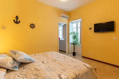 Letto o letti in una camera di Casa le Radici by Wonderful Italy
