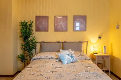 Letto o letti in una camera di Casa le Radici by Wonderful Italy