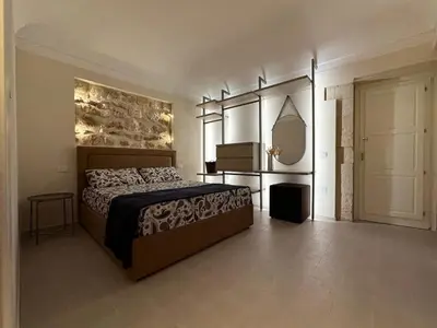 Letto o letti in una camera di Romantico bilocale ad Ortigia