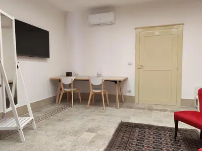 TV o dispositivi per l'intrattenimento presso Terrazza su Ortigia Confort Maison