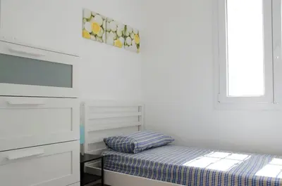 Letto o letti in una camera di 83 steps from the sea Sea-view terrace