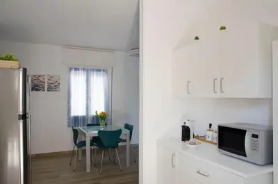 Cucina o angolo cottura di 83 steps from the sea Sea-view terrace
