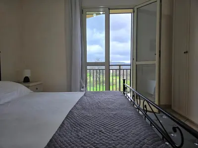 Letto o letti in una camera di Villa Sara