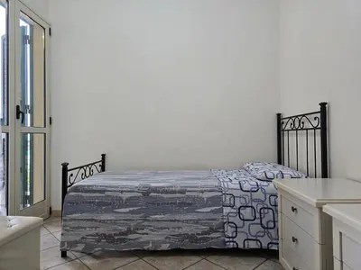 Letto o letti in una camera di Villa Sara