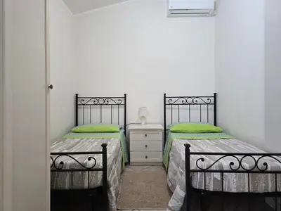 Letto o letti in una camera di Villa Sara