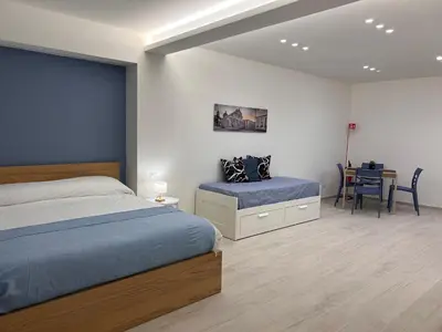 Letto o letti in una camera di The Duomo Flats
