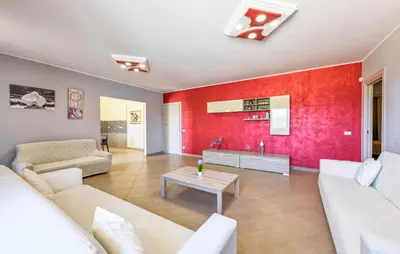 Area soggiorno di Cozy Home In Floridia
